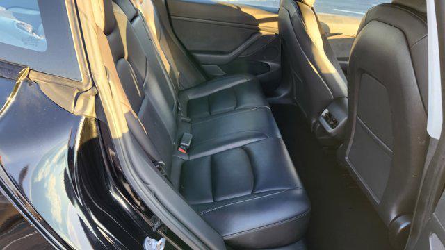 used 2023 Tesla Model 3 car, priced at $21,000