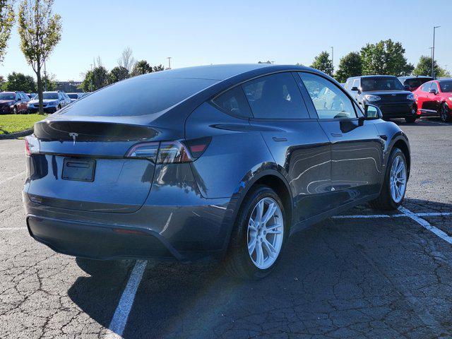 used 2023 Tesla Model Y car, priced at $31,000