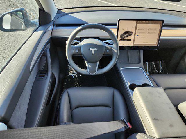 used 2023 Tesla Model Y car, priced at $31,000