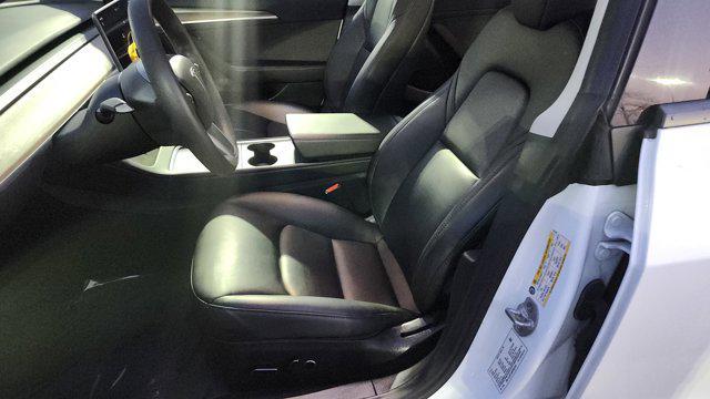 used 2023 Tesla Model 3 car, priced at $22,700