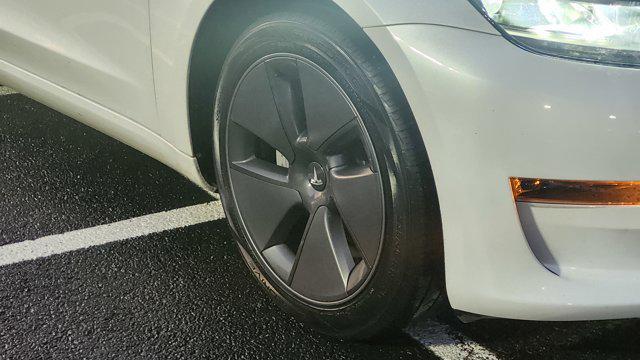 used 2023 Tesla Model 3 car, priced at $22,700