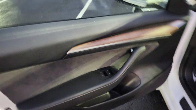 used 2023 Tesla Model 3 car, priced at $22,700