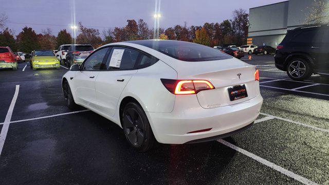 used 2023 Tesla Model 3 car, priced at $22,700