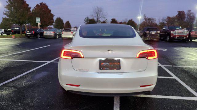 used 2023 Tesla Model 3 car, priced at $22,700