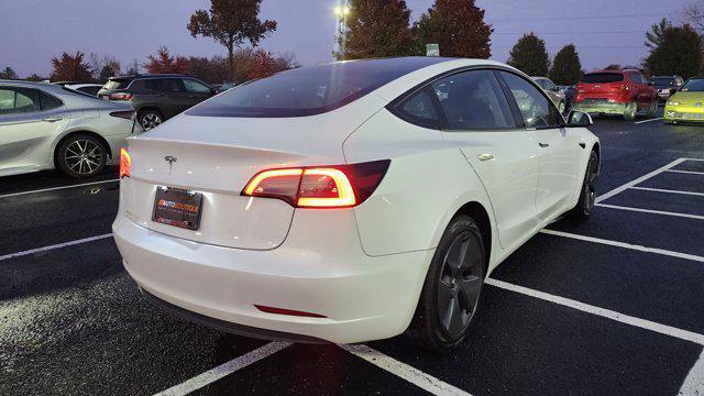 used 2023 Tesla Model 3 car, priced at $22,700