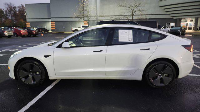 used 2023 Tesla Model 3 car, priced at $22,700