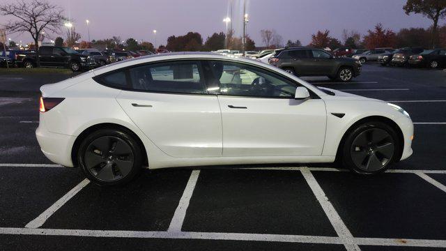 used 2023 Tesla Model 3 car, priced at $22,700