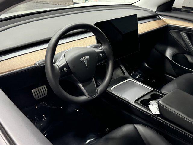 used 2022 Tesla Model 3 car, priced at $29,100