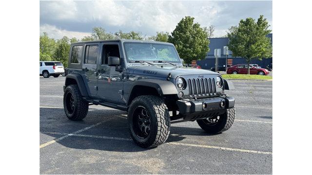 used 2014 Jeep Wrangler Unlimited car, priced at $15,045