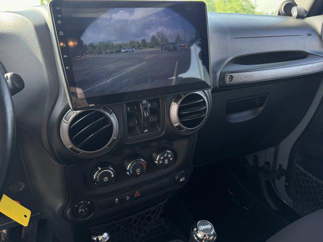 used 2014 Jeep Wrangler Unlimited car, priced at $15,045