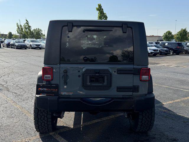 used 2014 Jeep Wrangler Unlimited car, priced at $15,045