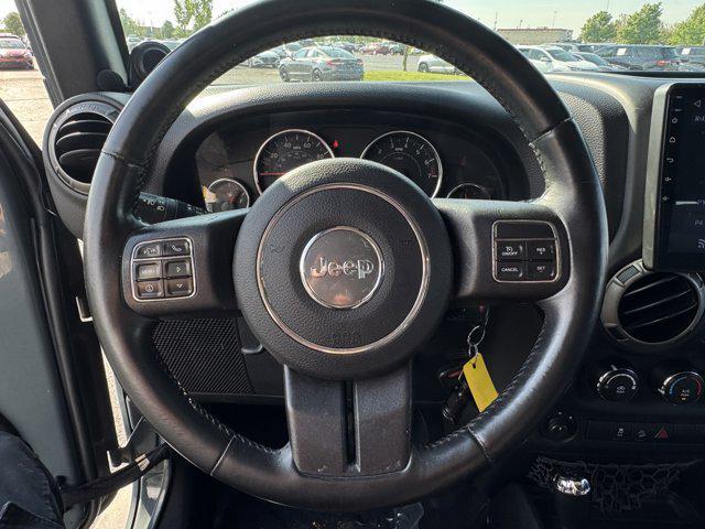 used 2014 Jeep Wrangler Unlimited car, priced at $15,045