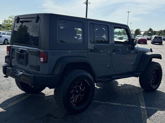 used 2014 Jeep Wrangler Unlimited car, priced at $15,045