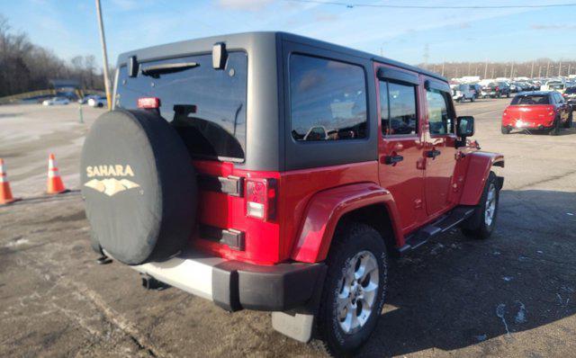 used 2015 Jeep Wrangler Unlimited car, priced at $19,545