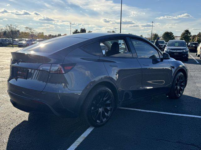 used 2023 Tesla Model Y car, priced at $28,900