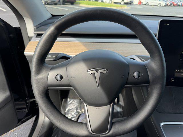 used 2024 Tesla Model Y car, priced at $28,500