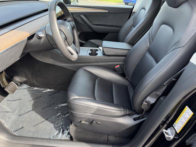 used 2024 Tesla Model Y car, priced at $28,500