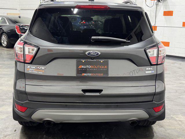 used 2018 Ford Escape car, priced at $12,900