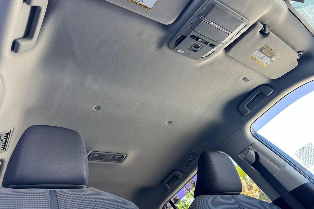 used 2021 Toyota Highlander Hybrid car, priced at $29,972