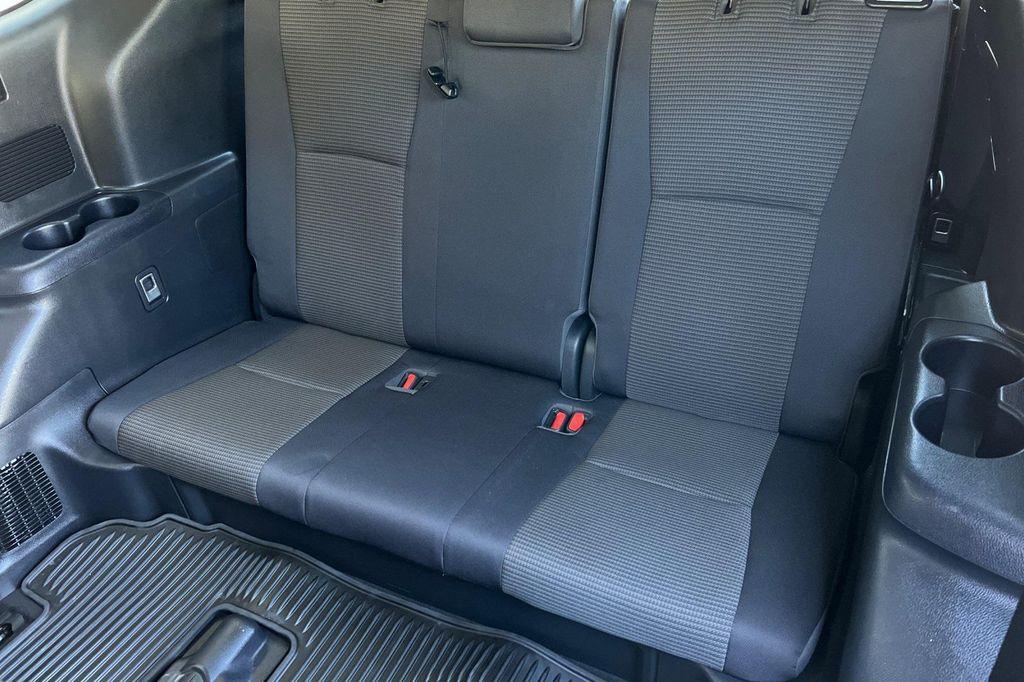 used 2021 Toyota Highlander Hybrid car, priced at $29,972
