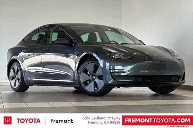 used 2022 Tesla Model 3 car, priced at $27,891