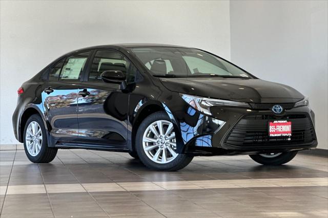 new 2025 Toyota Corolla Hybrid car, priced at $28,303