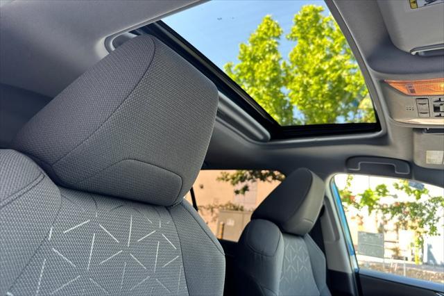 used 2021 Toyota RAV4 Hybrid car, priced at $28,388