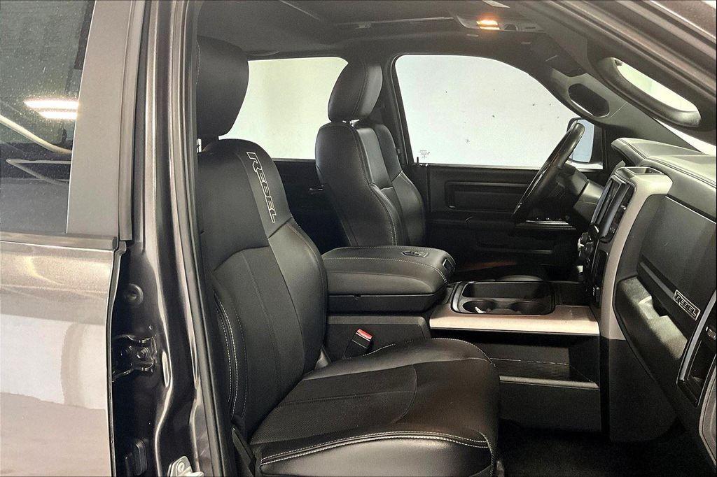 used 2018 Ram 1500 car, priced at $25,000