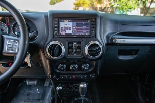 used 2015 Jeep Wrangler Unlimited car, priced at $29,950