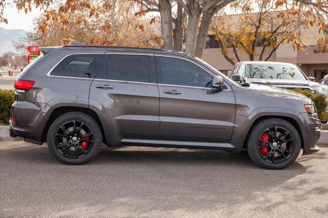 used 2014 Jeep Grand Cherokee car, priced at $31,499