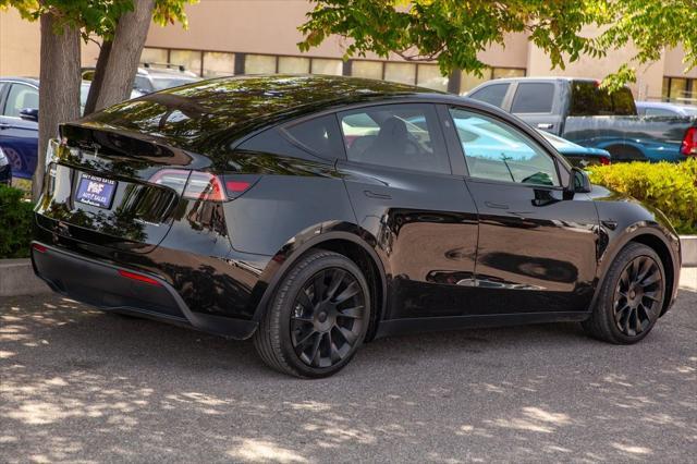 used 2024 Tesla Model Y car, priced at $36,950