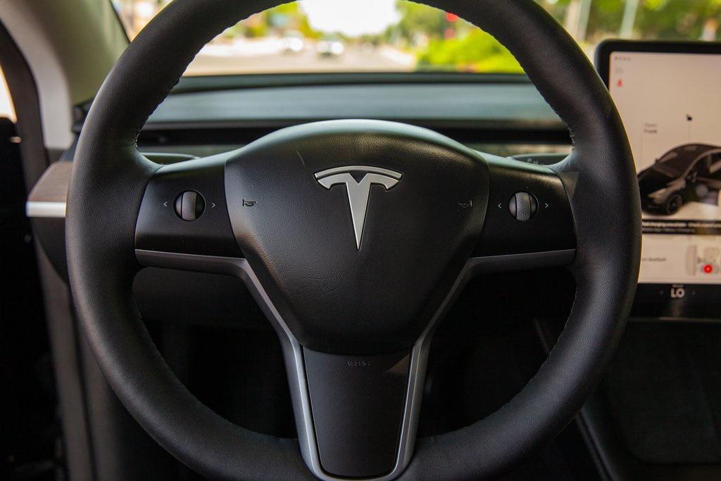 used 2024 Tesla Model Y car, priced at $36,499