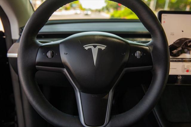 used 2024 Tesla Model Y car, priced at $36,950