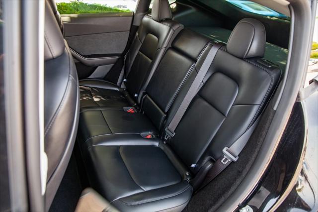used 2024 Tesla Model Y car, priced at $36,950