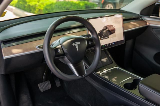 used 2024 Tesla Model Y car, priced at $36,950