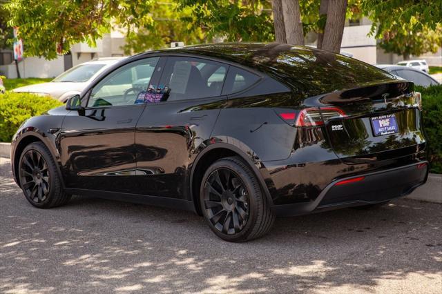 used 2024 Tesla Model Y car, priced at $36,950