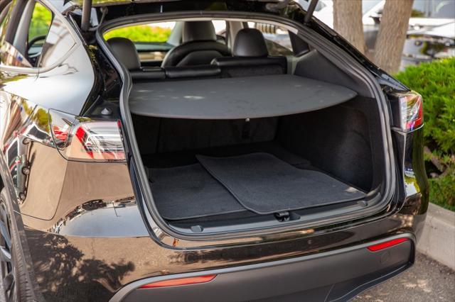 used 2024 Tesla Model Y car, priced at $36,950
