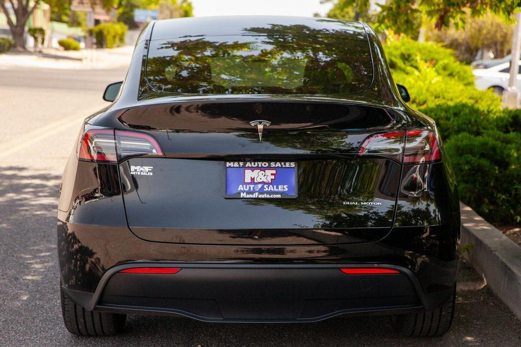 used 2024 Tesla Model Y car, priced at $36,499