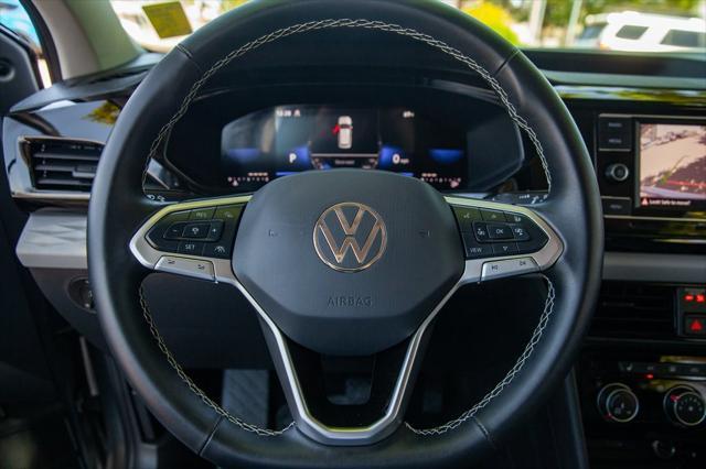 used 2024 Volkswagen Taos car, priced at $22,950