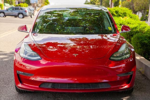 used 2018 Tesla Model 3 car, priced at $21,950