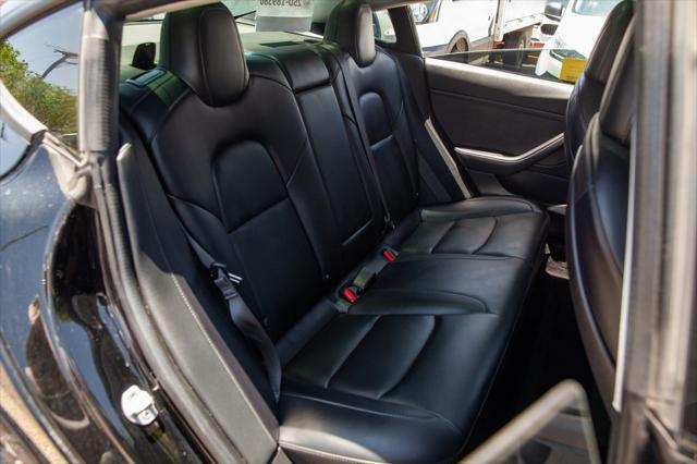 used 2018 Tesla Model 3 car, priced at $24,950
