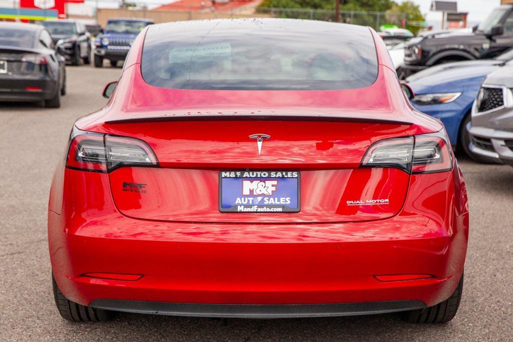 used 2021 Tesla Model 3 car, priced at $27,950