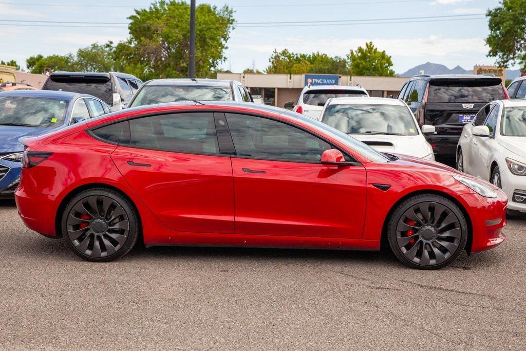 used 2021 Tesla Model 3 car, priced at $27,950