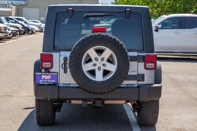 used 2014 Jeep Wrangler Unlimited car, priced at $20,950