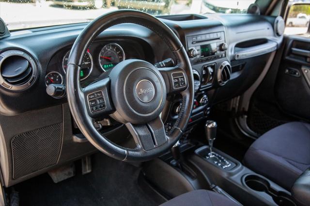 used 2014 Jeep Wrangler Unlimited car, priced at $20,950