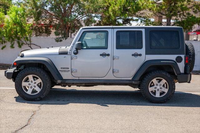 used 2014 Jeep Wrangler Unlimited car, priced at $20,950