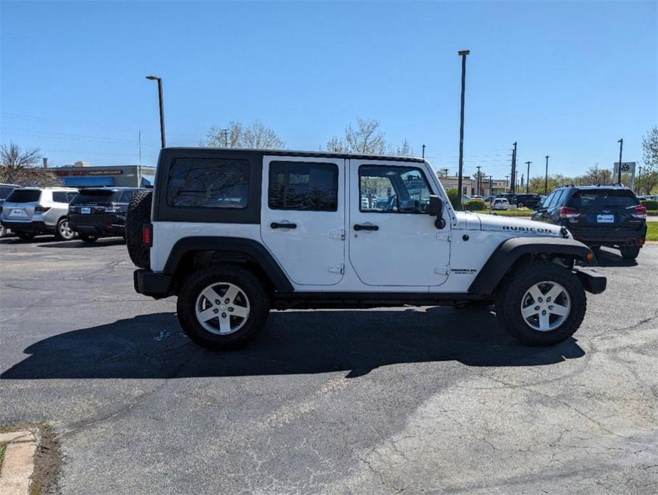 used 2011 Jeep Wrangler Unlimited car, priced at $18,335