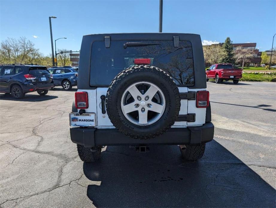 used 2011 Jeep Wrangler Unlimited car, priced at $18,335