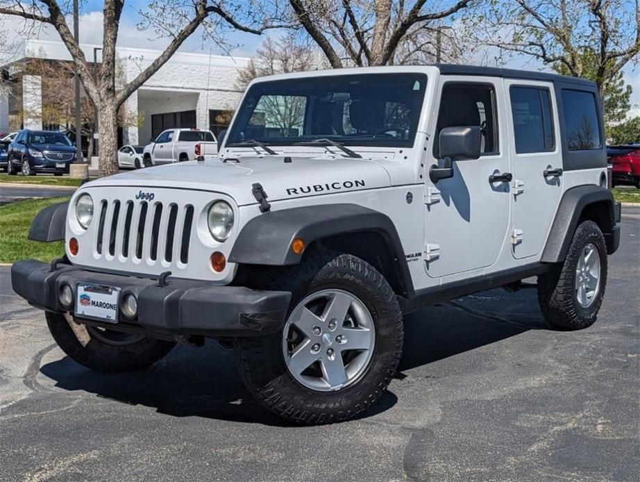 used 2011 Jeep Wrangler Unlimited car, priced at $18,879