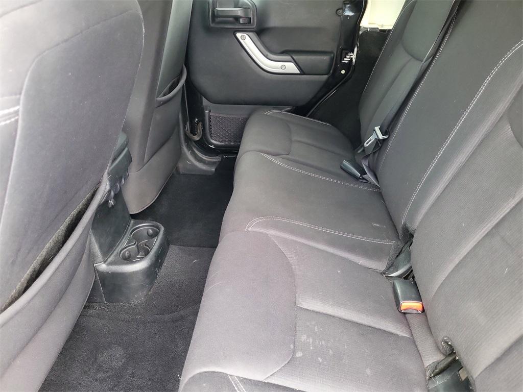 used 2013 Jeep Wrangler Unlimited car, priced at $13,517